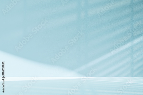 Blue Background, Soft Window Shadow, Natural Sunlight on Cement Wall And Floor Background,Minimal Empty Room Kitchen Studio With Abstract Light Pattern on Podium For Autumn Winter Product Display