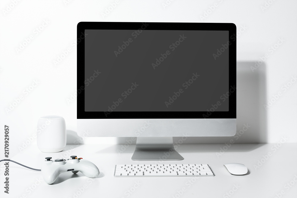 Fototapeta premium Modern workspace with gaming setup, suitable as mockup