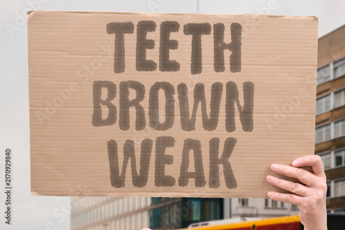 фотографія "Teeth brown weak" Tooth staining and enamel erosion from tannins acidity