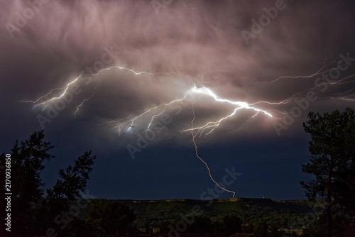 Fotografie Dramatic lightning strike over Provence