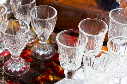 Antique crystal shot glasses, glass tumblers. Vintage clear shot glasses for drinks, a set of empty shot glasses, a collection.