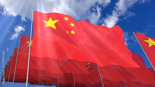 Multiple China flags waving on blue sky