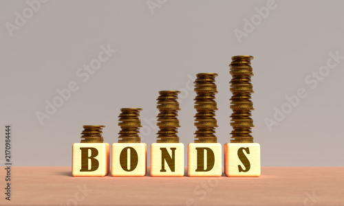 Bonds yield cube block wooden square us usa united state america golden price inflation recession investment bond yield debt finance economy interest rate bonds yield coin golden yellow orange color 