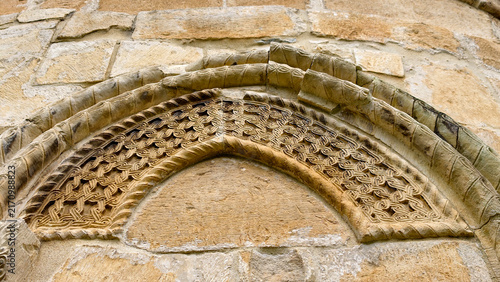 Konstfotografi Ancient stone carving forming a decorative archway, showcasing intricate medieva