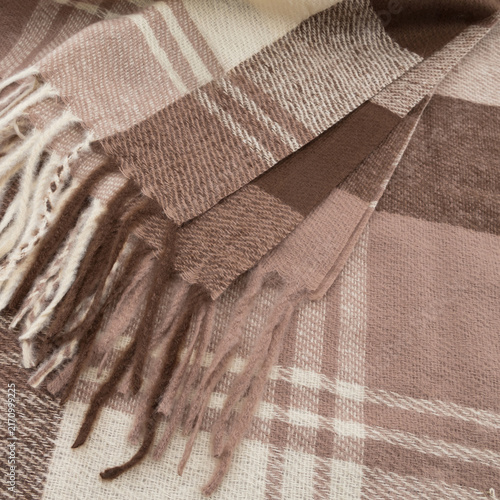 Piece of checkered plaid scarf close-up