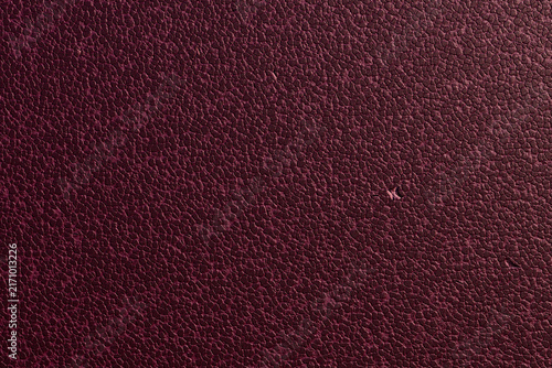 Dark burgundy leatherette texture background surface
