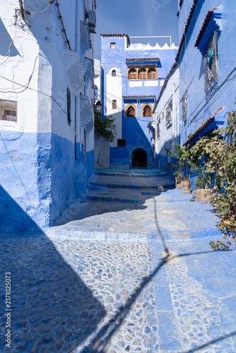 A blue painted alley in Chefchaouen, Morocco. Chefchaouen is a small city which is nicknamed the 
