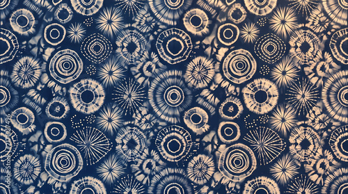 Seamless Shibori Tie Dye Pattern with Indigo Blue Circular Motifs on Transparent Background Isolated on White