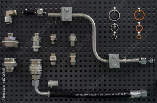 Cuadro en lienzo Hydraulic components set with fittings, quick disconnect coupler, bent metal pip