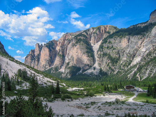 Quadro su tela upper part of the Fanes Valley - Val di Fanes, toward the iconic Pederü mountain inn visible in the bottom right corner