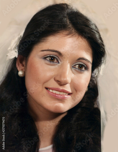 Beautiful young bride smiling on her wedding day