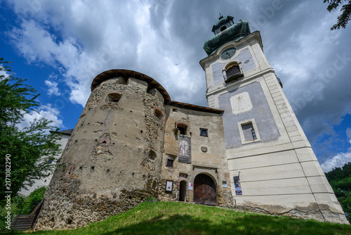 Round bastion and sundial clock tower of the Old Castle in Banska Stiavnica, Slovakia