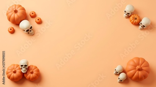 A festive halloween arrangement featuring pumpkins and skulls against a warm inviting and seasonally appropriate peach colored backdrop