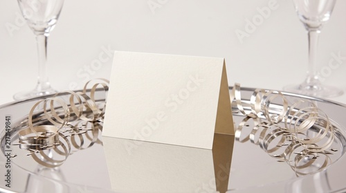 Blank celebration card with metallic party streamers