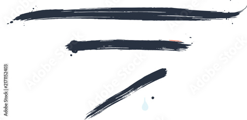 Three dark blue paint brush strokes of varying lengths and thicknesses isolated on a white background, with a small, light blue drop included