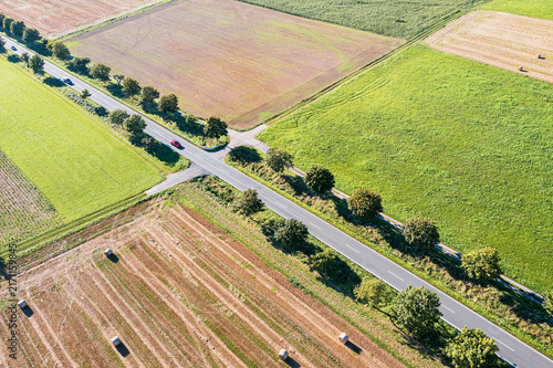 View from above of harvested grain fields and meadows in the Taunus.