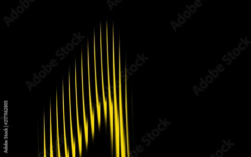 Abstract yellow light streaks on black background, vertical glowing lines motion effect