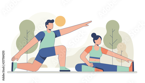 Young athletic man and woman doing physical stretching exercises and yoga on green mats in a peaceful outdoor park.