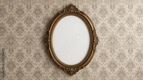 Ornate oval gold frame with intricate baroque details hanging on vintage damask wallpaper, copy space