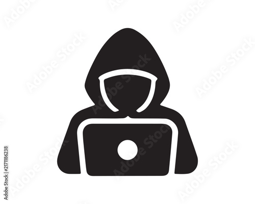 Bild auf Leinwand Anonymous hacker silhouette using a laptop computer with a hoodie on a transpare
