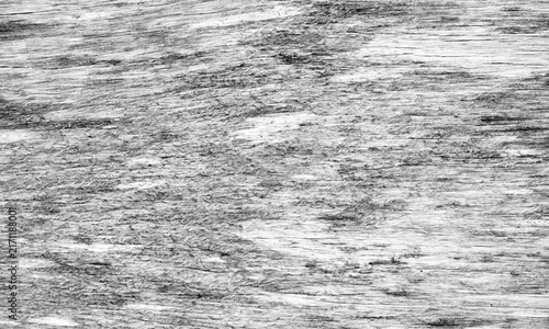 A close-up monochrome texture of weathered gray wood with visible grain and rustic character, abstract backggound photo