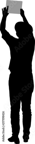 Black silhouette of woman taking selfie with smartphone on white background