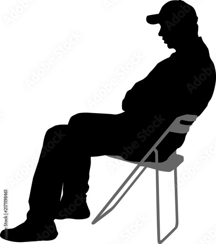 Black silhouette of man sitting on folding chair on white background