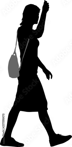 lack silhouette of woman walking with raised arm on white background