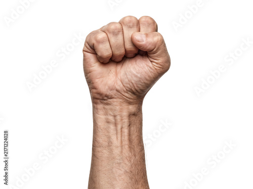 Raised clenched fist on white background, powerful male hand gesture of strength and protest, solid arm showing power and unity