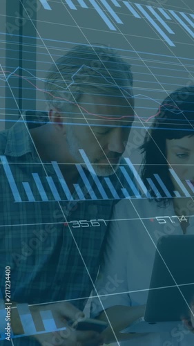 Analyzing financial data on laptop, business people with charts animation over them