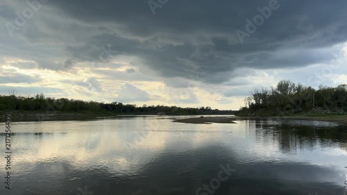 Dramatic clouds over the Vistula River in summer.