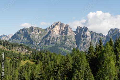 Dolomites, Italy. Dramatic mountain peaks and alpine forest landscape near the trail to Rifugio Sonoro al Coldai