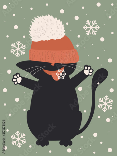 Cute black cat in a big winter hat catching snowflakes, funny Christmas kitten cartoon character illustration for holiday greeting card and print.