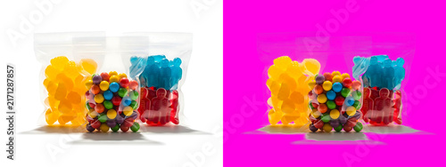 Three transparent plastic pouches filled with colorful round candy, isolated on a white background, for product display isolated on a transparent background