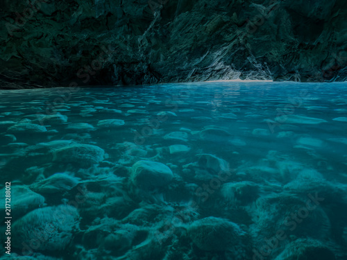 Secret Cave. The Blue Cave in Albania is a mesmerizing natural wonder known for its vibrant azure waters and stunning rock formations.
