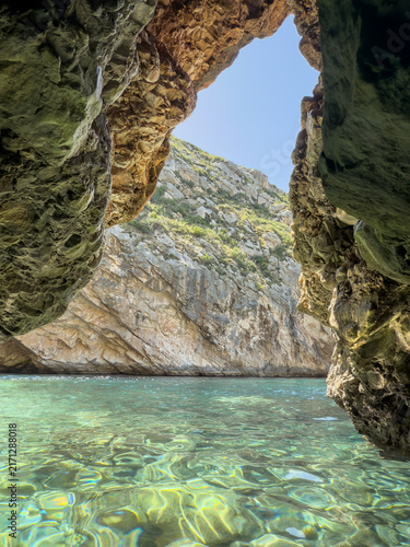 Secret Cave. The Blue Cave in Albania is a mesmerizing natural wonder known for its vibrant azure waters and stunning rock formations.