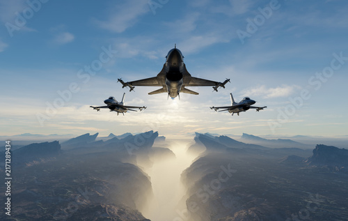 Three Fighter Jets Flying in Tight Formation Over Misty Mountain Canyon at Sunrise