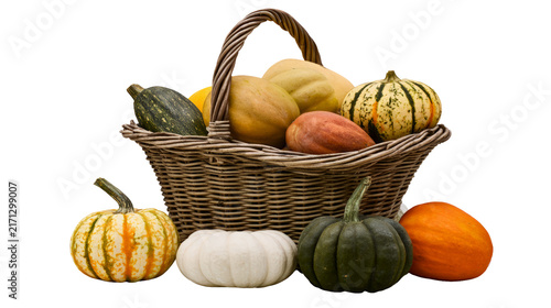 Assorted fresh pumpkins and squashes in wicker basket isolated on transparent background for png image file