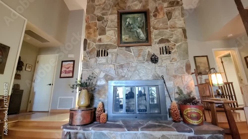 Rustic living room with stone fireplace