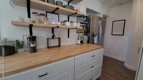 Bright white kitchen with warm wood accents