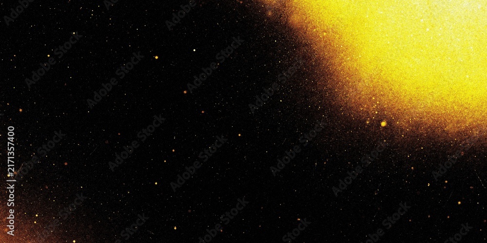 Fototapeta premium Abstract golden light flare on black background with grainy texture and glowing particles.