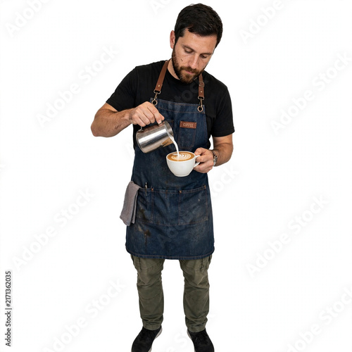 Barista male pouring milk into coffee mug for latte art preparation against plain white background.