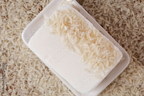 Fotografie Handmade Rice Soap Bar in Soap Dish Flat Lay Top View