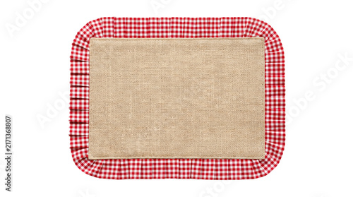 Fotografie Rustic burlap placemat featuring classic red and white checkered fabric ruffles