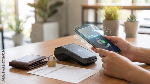 Obraz na płótnie Secure contactless mobile payment transaction using smartphone with fingerprint biometric authentication for retail