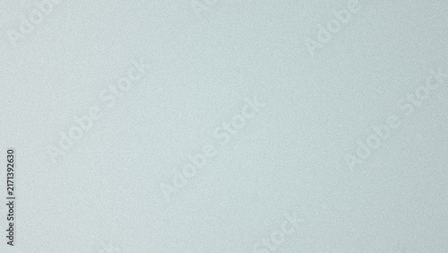 A soft and light pastel blue background, with a subtle, grainy texture and, a smooth uniform, surface appearance for use