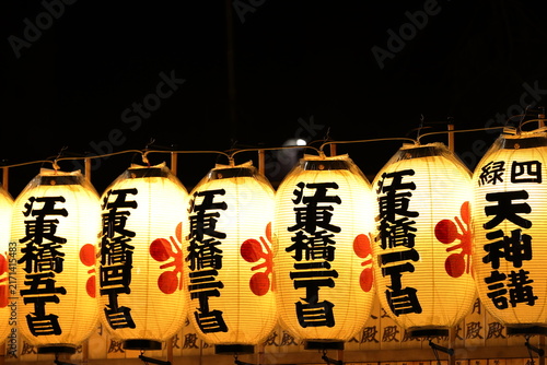 Kento Myo: Traditional Japanese summer lanterns glowing at a shrine at night / 日本の夏の伝統行事 献灯明 神社の夜に連なる提灯の幻想的な風景