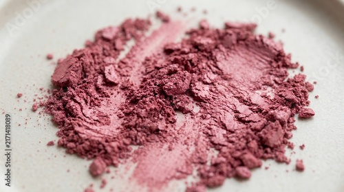 Pulverized rose colored cosmetic pigment forming an uneven artistic surface structure pulverized rose-colored cosmetic pigment uneven artistic surface structure makeup powder blush eyeshadow pink
