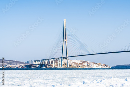 Photography Russky Bridge in Vladivostok Primorsky Krai Russia in winter with frozen sea ice