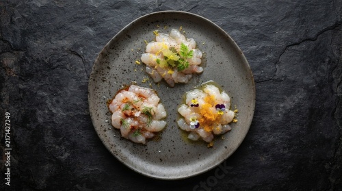 Overhead Flat Lay Raw Scampi Crudo Trio Arranged Triangle Plate Isolated Bare Dark Surface

